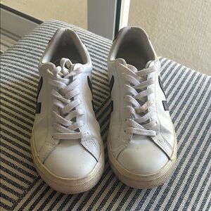 White Low-Top Sneakers with Black Side Accent